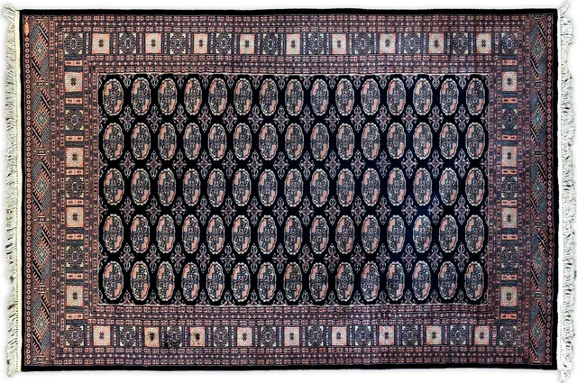 Handwoven rug No. U301, 5′ × 7′